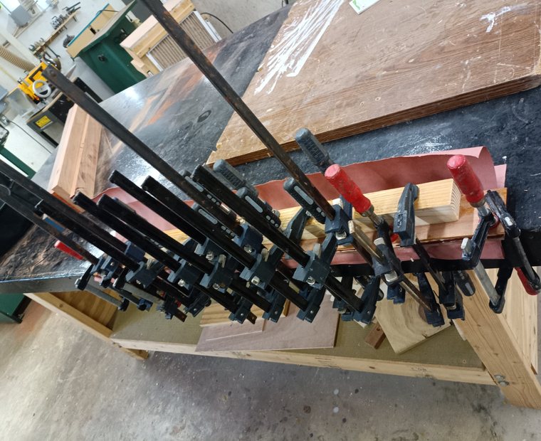 Board glue-up clamp stage for a segmented wood bowl