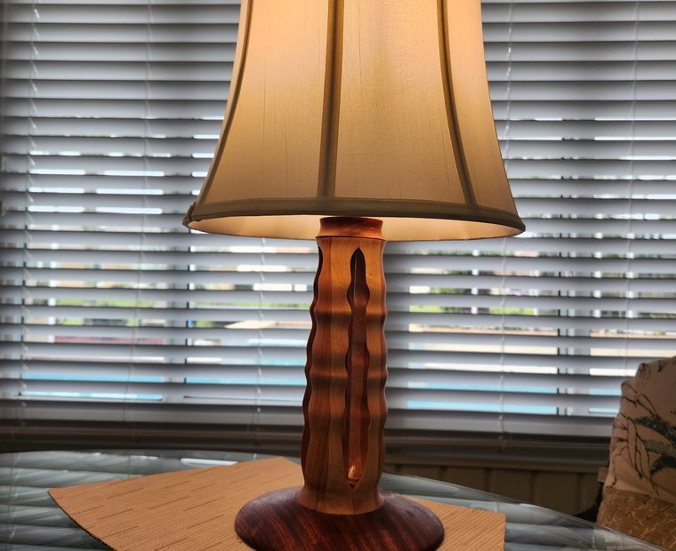 Variation of a handcrafted turned wood lamp